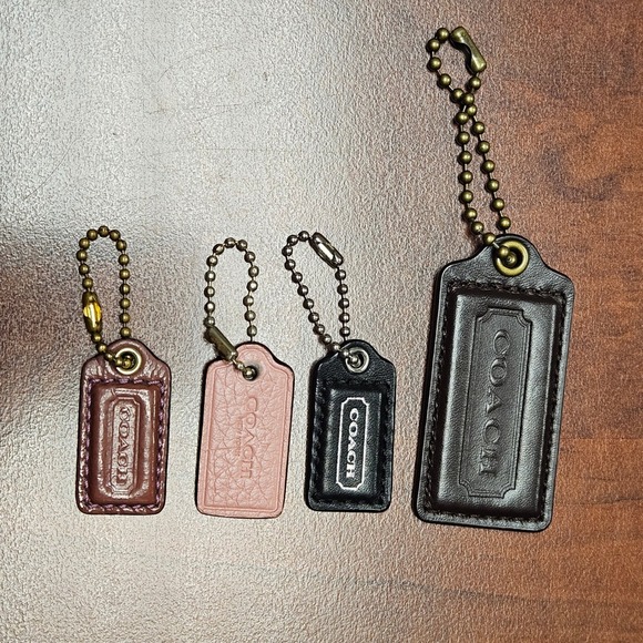 Coach hang tags lot of 4- 1 Large and 3 Mini Black Brown Pink & Burgundy